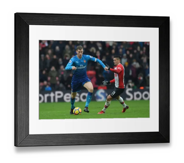 Framed Print : Per Mertesacker vs. Dusan Tadic: A Football Rivalry in the Southampton vs. Arsenal Premier League Clash (December 2017) Framed Print : Per Mertesacker vs. Dusan Tadic: A Football Rivalry in the Southampton vs. Arsenal Premier League Clash (December 2017)