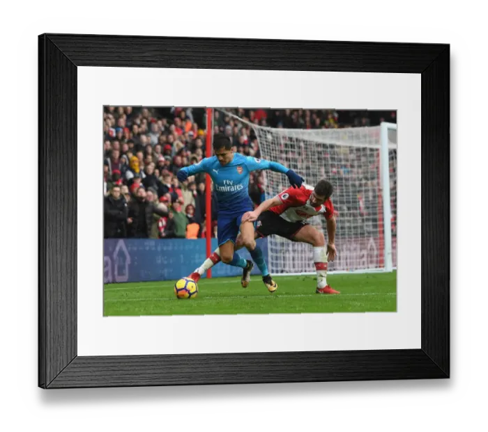 Framed Print : Clash of Forces: Sanchez vs. Stephens in Southampton vs. Arsenal Premier League Showdown Framed Print : Clash of Forces: Sanchez vs. Stephens in Southampton vs. Arsenal Premier League Showdown