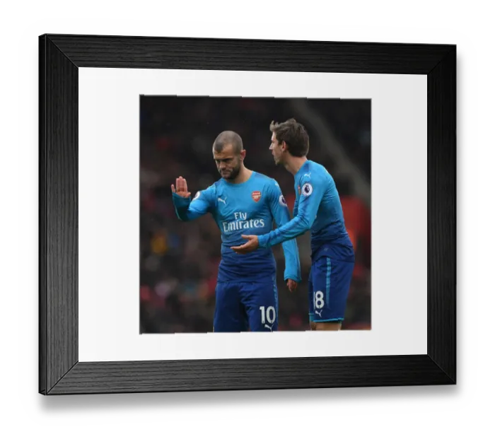 Framed Print : Unwavering Focus: Monreal and Wilshere's Intense Concentration during Arsenal's Premier League Clash at Southampton (2017-18) Framed Print : Unwavering Focus: Monreal and Wilshere's Intense Concentration during Arsenal's Premier League Clash at Southampton (2017-18)