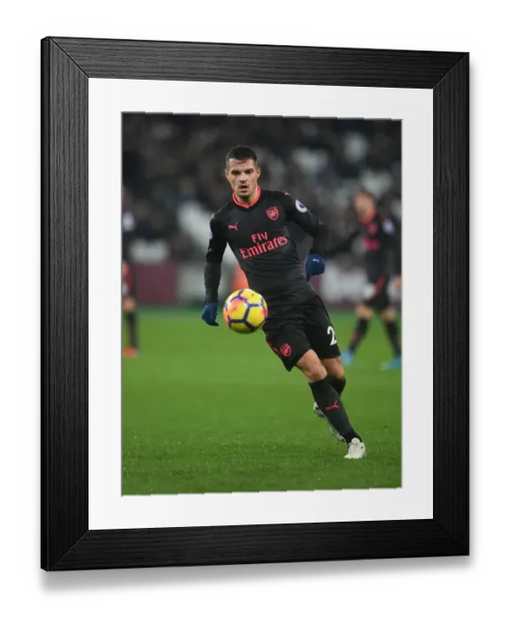 Framed Print : Granit Xhaka in Action: West Ham United vs Arsenal, Premier League 2017-18