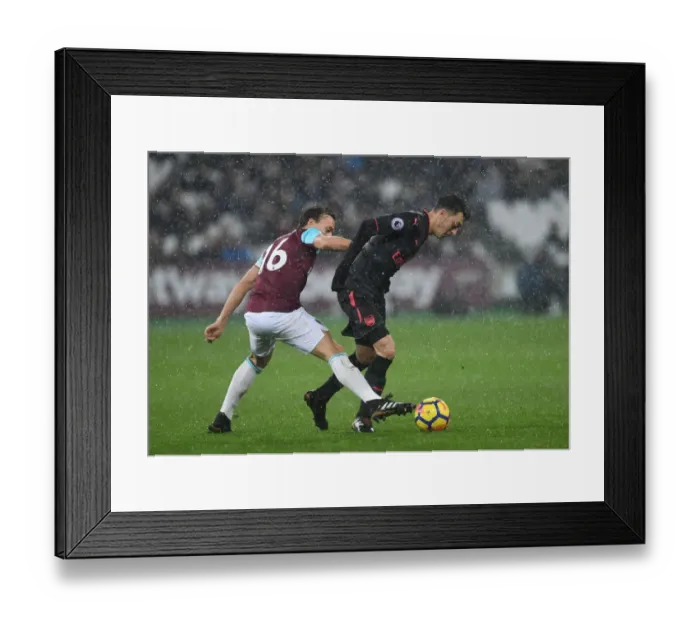 Framed Print : Mesut Ozil vs Mark Noble: A Premier League Showdown Framed Print : Mesut Ozil vs Mark Noble: A Premier League Showdown