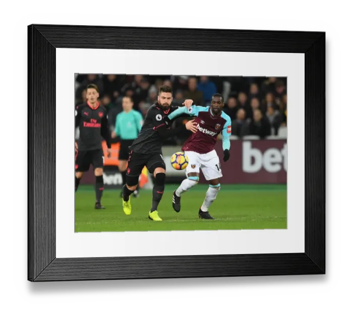 Framed Print : Giroud vs Obiang: Intense Clash Between West Ham and Arsenal in Premier League Framed Print : Giroud vs Obiang: Intense Clash Between West Ham and Arsenal in Premier League