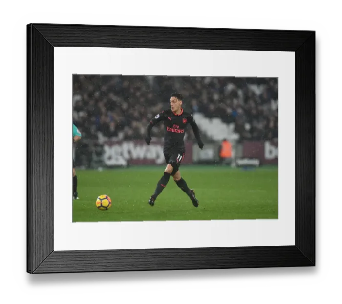 Framed Print : Mesut Ozil in Action: Premier League Clash between Arsenal and West Ham (2017-18) Framed Print : Mesut Ozil in Action: Premier League Clash between Arsenal and West Ham (2017-18)