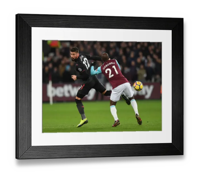 Framed Print : Giroud vs Ogbonna: A Football Showdown at London Stadium - West Ham United vs Arsenal, Premier League 2017-18