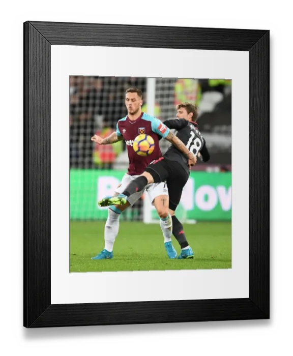 Framed Print : Monreal vs Arnautovic: A Premier League Showdown at London Stadium