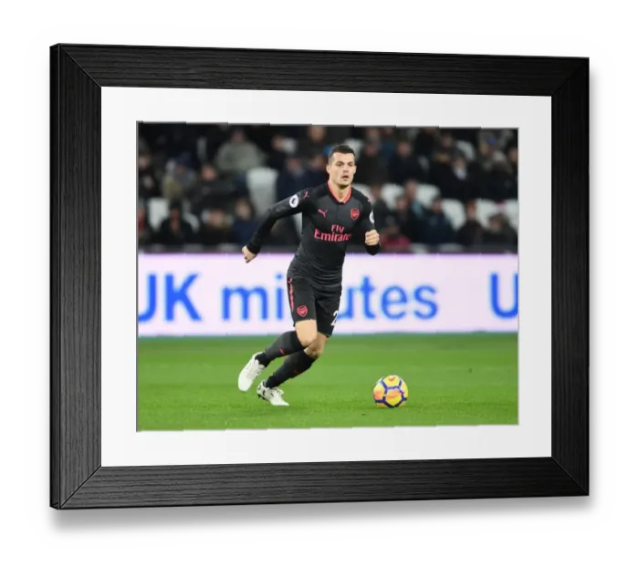 Framed Print : Granit Xhaka in Action: West Ham United vs. Arsenal, Premier League 2017-18