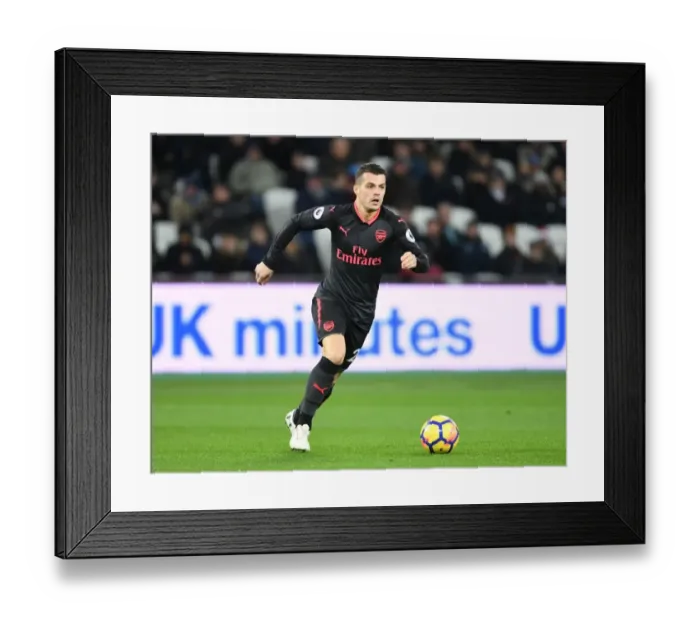 Framed Print : Granit Xhaka: Arsenal Midfielder in Action Against West Ham United, Premier League 2017-18