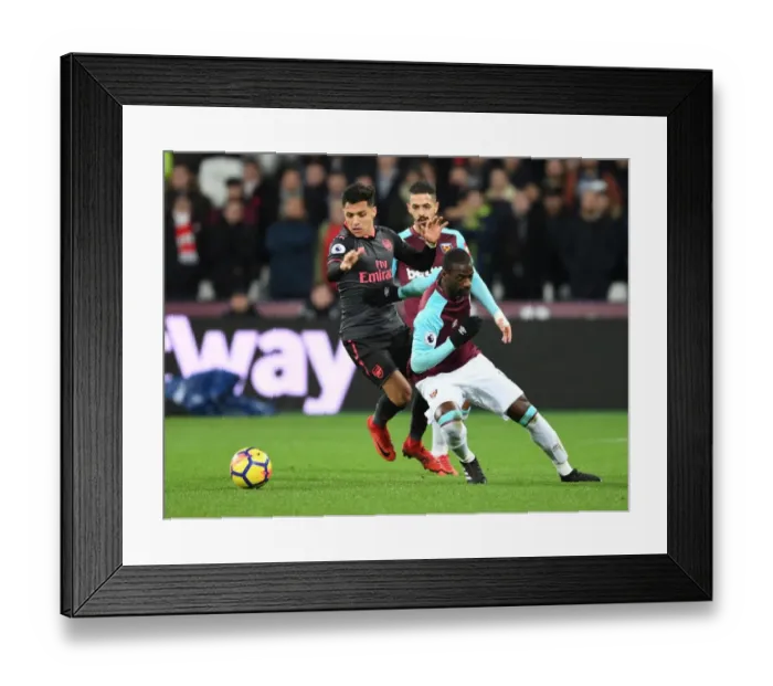 Framed Print : Arsenal's Alexis Sanchez Outmaneuvers West Ham's Pedro Obiang Framed Print : Arsenal's Alexis Sanchez Outmaneuvers West Ham's Pedro Obiang