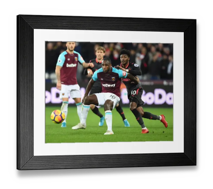 Framed Print : Arsenal vs. West Ham United: Premier League Clash at London Stadium (December 2017) Framed Print : Arsenal vs. West Ham United: Premier League Clash at London Stadium (December 2017)