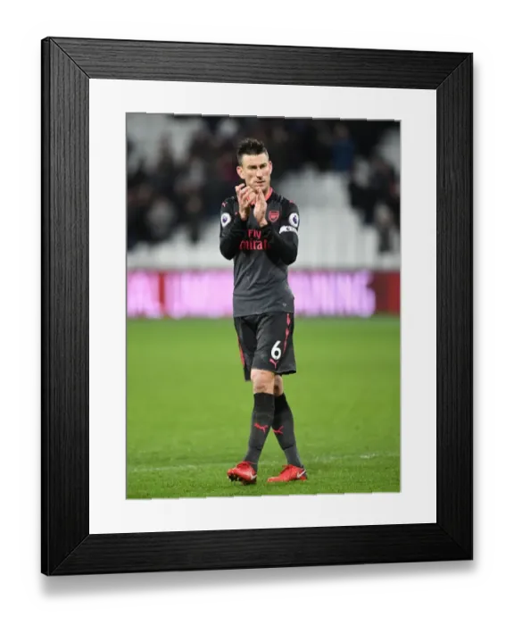 Framed Print : Arsenal's Laurent Koscielny Celebrates with Fans after West Ham Victory