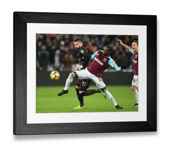 Framed Print : Clash at London Stadium: Giroud vs. Obiang - West Ham United vs. Arsenal, Premier League 2017-18 Framed Print : Clash at London Stadium: Giroud vs. Obiang - West Ham United vs. Arsenal, Premier League 2017-18