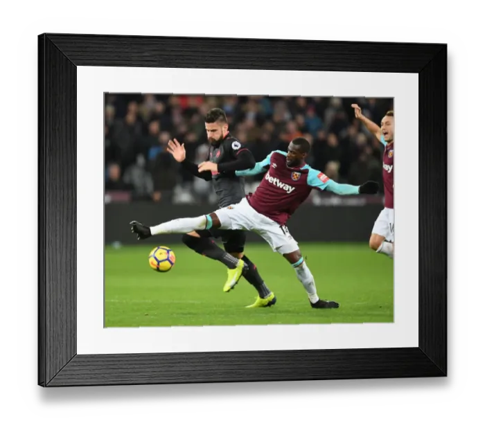 Framed Print : Giroud vs. Obiang: A Premier League Battle at London Stadium Framed Print : Giroud vs. Obiang: A Premier League Battle at London Stadium