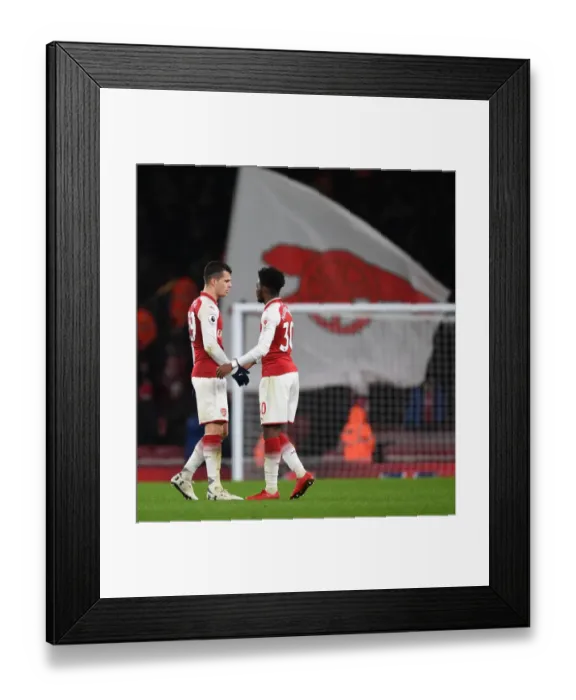 Framed Print : Arsenal Duo: Xhaka and Maitland-Niles Share a Moment after Arsenal vs Newcastle United (2017-18)