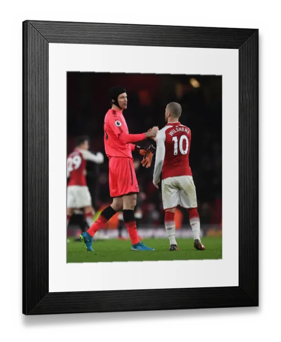 Framed Print : Arsenal: Cech and Wilshere Celebrate Victory over Newcastle United