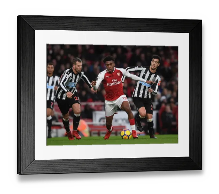 Framed Print : Arsenal's Alex Iwobi Clashes with Newcastle's Merino and Lejeune during Premier League Match