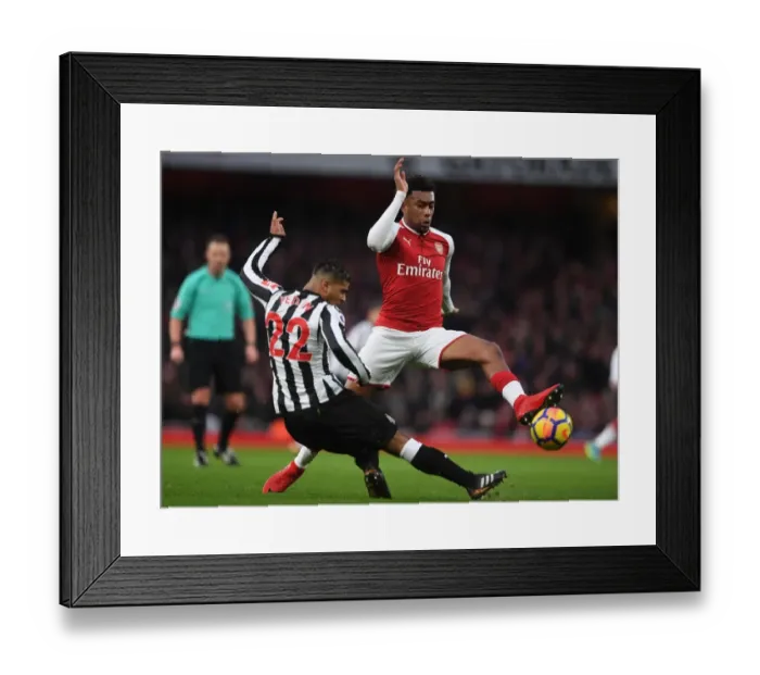 Framed Print : Arsenal vs Newcastle United: Iwobi Faces Off Against Yedlin in Premier League Clash