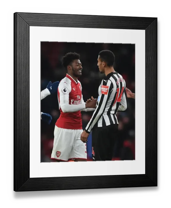 Framed Print : Arsenal's Ainsley Maitland-Niles and Newcastle's Isaac Hayden Share a Moment After intense Arsenal v Newcastle United Premier League Clash (2017-18) Framed Print : Arsenal's Ainsley Maitland-Niles and Newcastle's Isaac Hayden Share a Moment After intense Arsenal v Newcastle United Premier League Clash (2017-18)