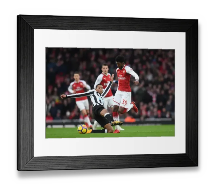 Framed Print : Maitland-Niles vs Hayden: A Midfield Battle at the Emirates