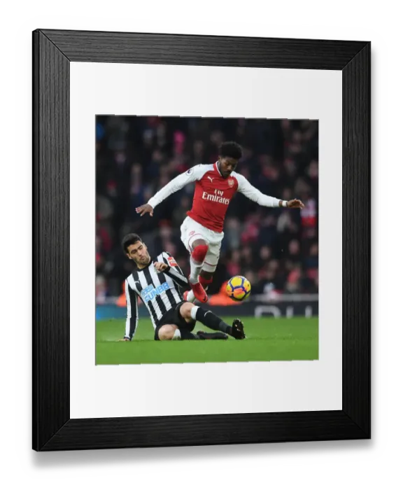 Framed Print : Arsenal vs Newcastle United: Ainsley Maitland-Niles vs Mikel Merino Clash in the Premier League