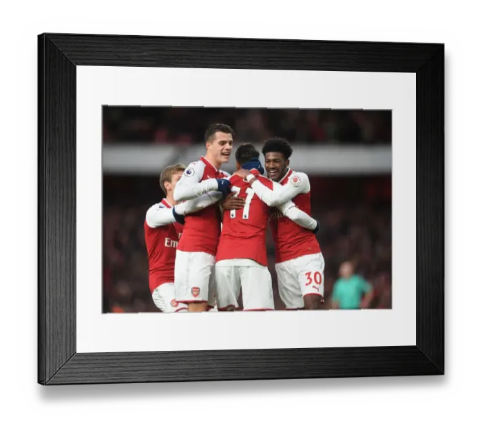 Framed Print : Arsenal's Triumph: Ozil, Xhaka, Maitland-Niles in Unison - Goal Celebration (2017-18) Framed Print : Arsenal's Triumph: Ozil, Xhaka, Maitland-Niles in Unison - Goal Celebration (2017-18)