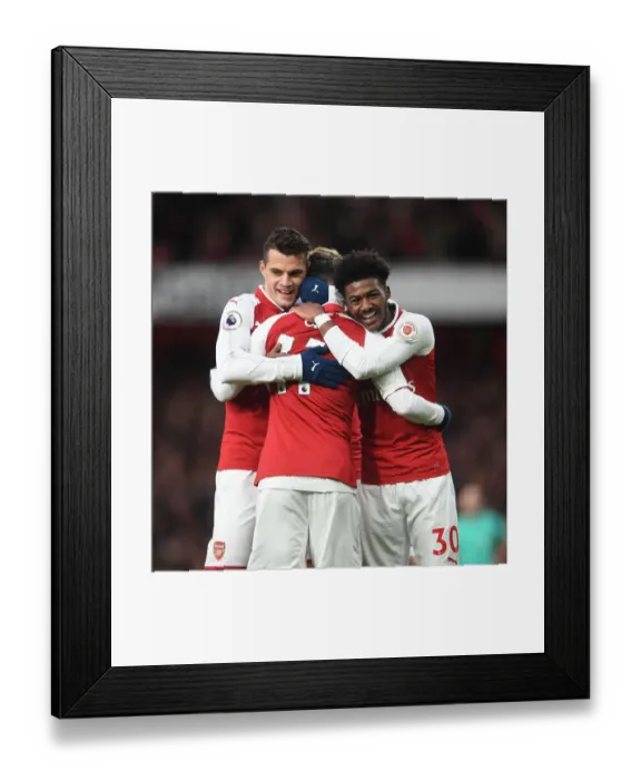 Framed Print : Arsenal's Triumph: Ozil, Xhaka, Maitland-Niles in Unison - Goal Celebration (2017-18) Framed Print : Arsenal's Triumph: Ozil, Xhaka, Maitland-Niles in Unison - Goal Celebration (2017-18)