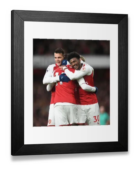 Framed Print : Arsenal Triumph: Ozil, Xhaka, Maitland-Niles Celebrate Goal vs Newcastle United (2017-18) Framed Print : Arsenal Triumph: Ozil, Xhaka, Maitland-Niles Celebrate Goal vs Newcastle United (2017-18)