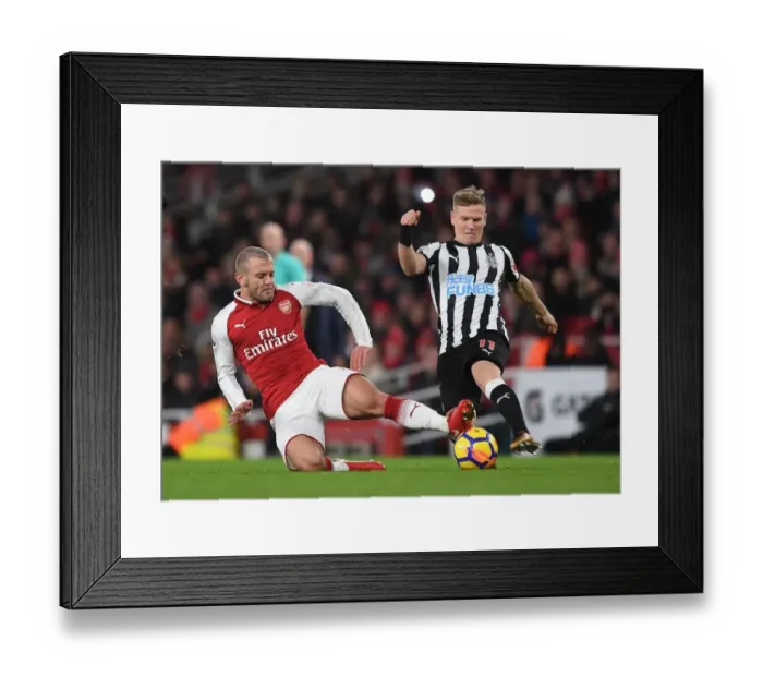 Framed Print : Arsenal vs Newcastle United: Wilshere vs Ritchie in Intense Premier League Clash Framed Print : Arsenal vs Newcastle United: Wilshere vs Ritchie in Intense Premier League Clash
