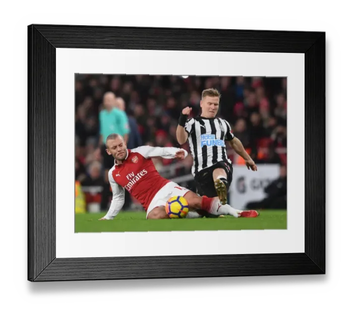 Framed Print : Intense Rivalry: Wilshere vs Ritchie in Arsenal vs Newcastle United Premier League Showdown Framed Print : Intense Rivalry: Wilshere vs Ritchie in Arsenal vs Newcastle United Premier League Showdown
