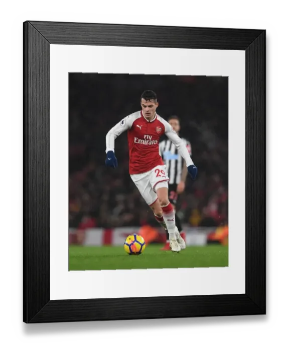 Framed Print : Granit Xhaka: Arsenal Midfielder in Action against Newcastle United, Premier League 2017-18 Framed Print : Granit Xhaka: Arsenal Midfielder in Action against Newcastle United, Premier League 2017-18