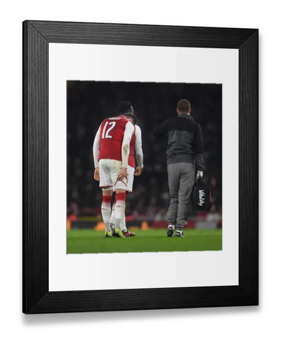 Framed Print : Arsenal's Olivier Giroud Suffers Injury in Carabao Cup Quarterfinal vs West Ham Framed Print : Arsenal's Olivier Giroud Suffers Injury in Carabao Cup Quarterfinal vs West Ham