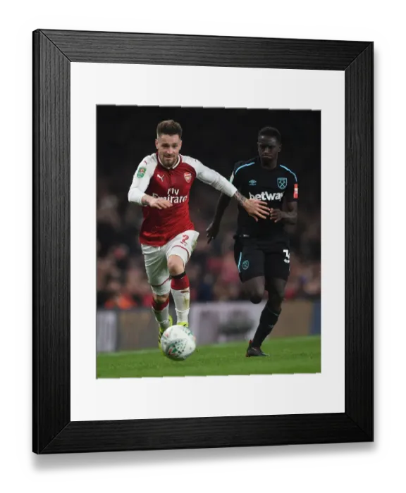 Framed Print : Arsenal's Debuchy Clashes with West Ham's Quina in Carabao Cup Quarterfinal