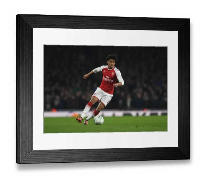 Framed Print : Reiss Nelson in Action: Arsenal vs. West Ham United - Carabao Cup Quarterfinal Framed Print : Reiss Nelson in Action: Arsenal vs. West Ham United - Carabao Cup Quarterfinal