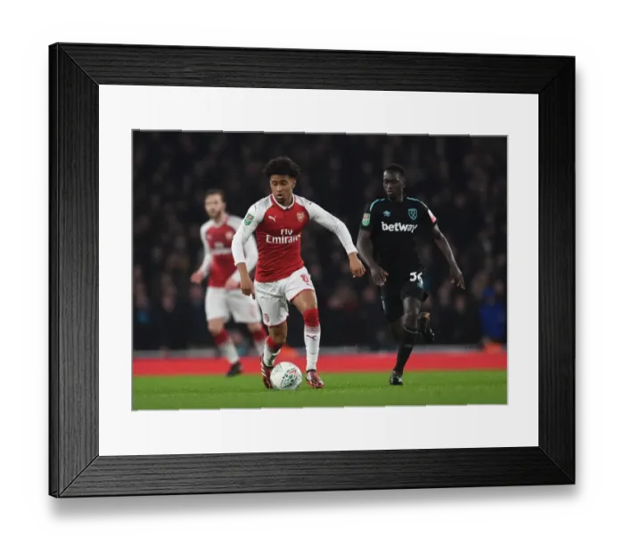 Framed Print : Reiss Nelson vs. Domingos Quina: Carabao Cup Clash at Arsenal's Emirates Stadium