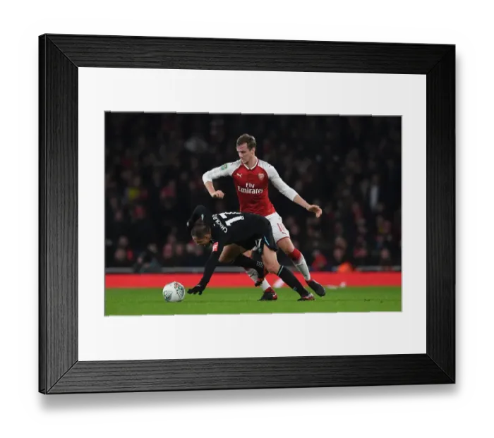 Framed Print : Clash at the Emirates: Holding vs. Hernandez in the Carabao Cup Quarterfinals