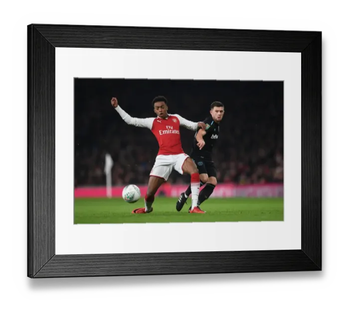 Framed Print : Arsenal vs. West Ham: Clash between Joe Willock and Aaron Cresswell in Carabao Cup Quarterfinal Framed Print : Arsenal vs. West Ham: Clash between Joe Willock and Aaron Cresswell in Carabao Cup Quarterfinal