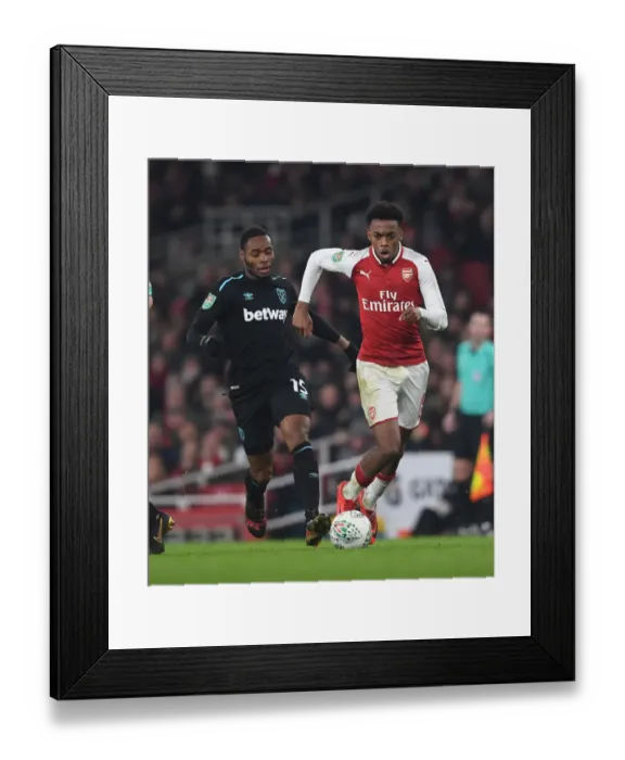 Framed Print : Arsenal's Joe Willock Clashes with West Ham's Diafra Sakho in Carabao Cup Quarterfinal