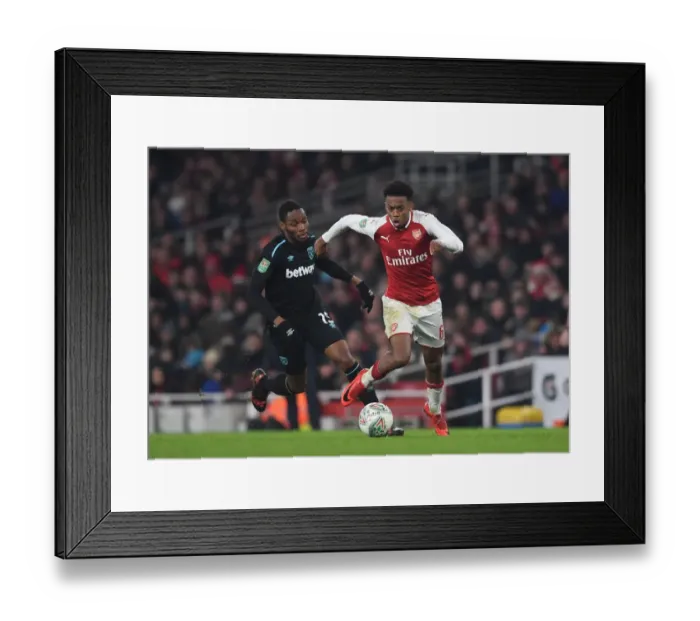 Framed Print : Arsenal's Joe Willock vs. Diafra Sakho: Intense Showdown in Carabao Cup Clash
