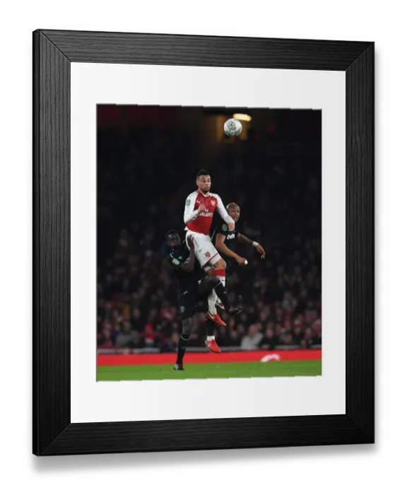 Framed Print : Arsenal vs. West Ham: Coquelin Faces Off Against Ayew and Quina in Carabao Cup Showdown