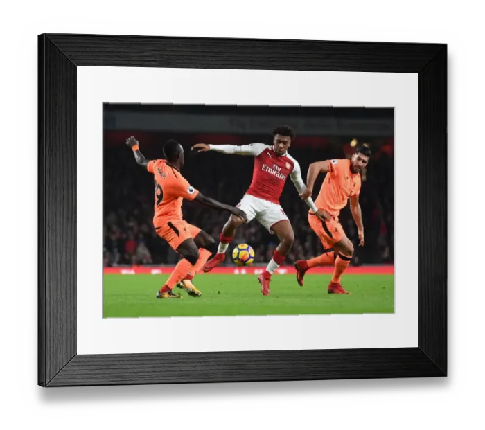 Framed Print : Clash of Stars: Iwobi vs. Mane & Can - Arsenal's Battle with Liverpool's Dynamic Duo (2017-18)