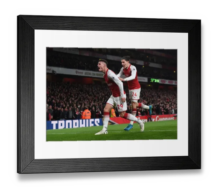 Framed Print : Xhaka and Bellerin Celebrate Arsenal's Winning Goal Against Liverpool (2017-18)