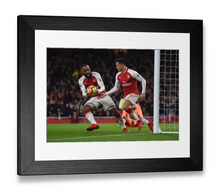 Framed Print : Arsenal's Deadly Duo: Sanchez and Lacazette Celebrate Goal Against Liverpool (2017-18) Framed Print : Arsenal's Deadly Duo: Sanchez and Lacazette Celebrate Goal Against Liverpool (2017-18)