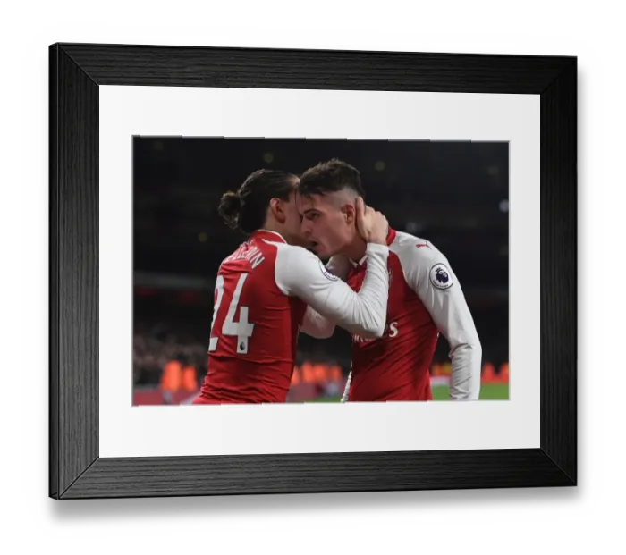 Framed Print : Arsenal's Unstoppable Duo: Xhaka and Bellerin's Goal Celebrations vs. Liverpool (2017-18)