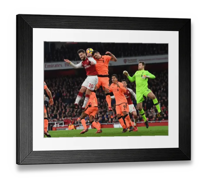 Framed Print : Mustafi vs. Lovren: Intense Clash Between Arsenal and Liverpool Players