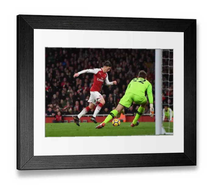 Framed Print : Mesut Ozil scores Arsenals 3rd goal. Arsenal 3: 3 Liverpool Framed Print : Mesut Ozil scores Arsenals 3rd goal. Arsenal 3: 3 Liverpool