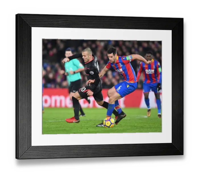 Framed Print : Clash at Selhurst Park: Wilshere vs. Dann in Premier League Battle