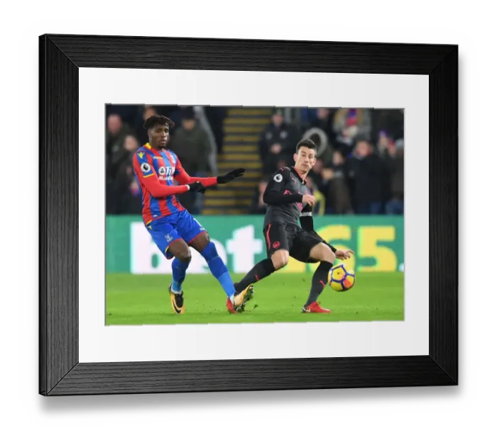 Framed Print : Clash at Selhurst Park: Koscielny vs. Zaha in Premier League Showdown Framed Print : Clash at Selhurst Park: Koscielny vs. Zaha in Premier League Showdown