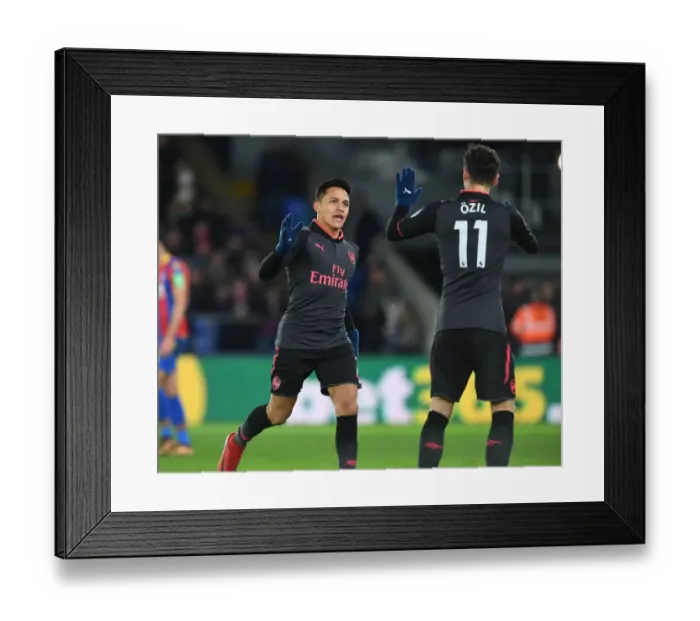 Framed Print : Jubilant Moment: Sanchez and Ozil's Euphoric Goal Celebration for Arsenal vs Crystal Palace (2017-18)