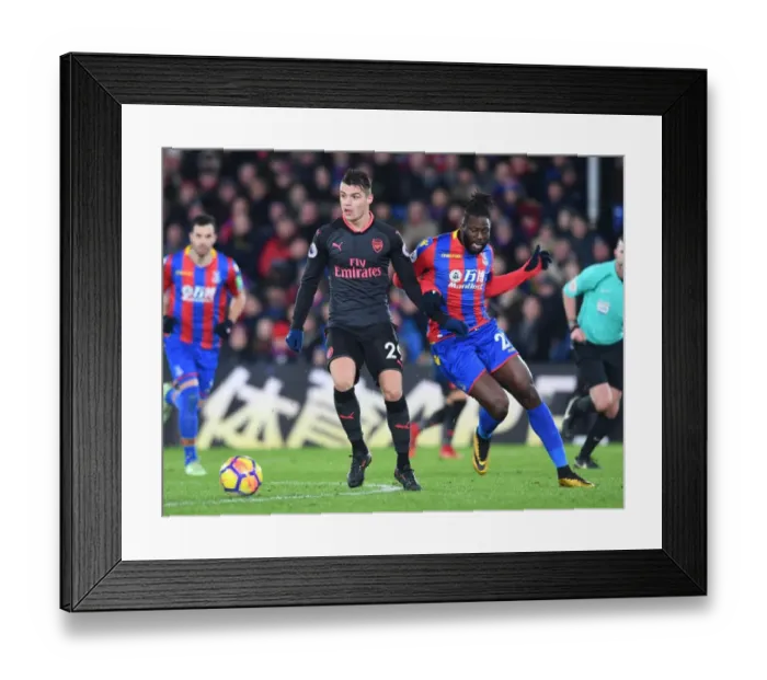 Framed Print : Granit Xhaka vs Bakary Sako: A Battle in the Premier League Clash Between Crystal Palace and Arsenal
