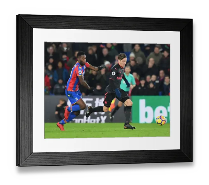 Framed Print : Mesut Ozil Outmaneuvers Timothy Fosu-Mensah in Crystal Palace vs Arsenal Premier League Clash Framed Print : Mesut Ozil Outmaneuvers Timothy Fosu-Mensah in Crystal Palace vs Arsenal Premier League Clash