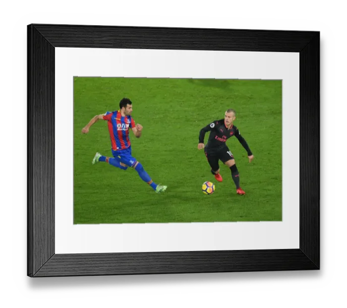 Framed Print : Jack Wilshere (Arsenal) Luka Milijovic (Palace) Framed Print : Jack Wilshere (Arsenal) Luka Milijovic (Palace)